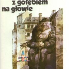 Chłopak z gołębiem na głowie