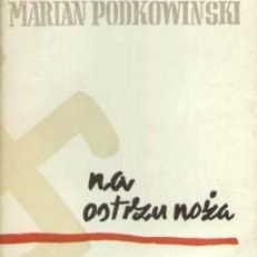 Na ostrzu noża.